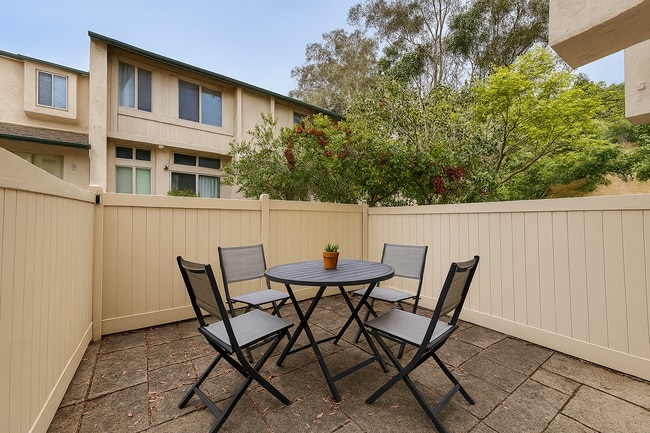 Photo - Move in Ready! 2BD Townhome! New Carpet! Two Patio Spaces! Attached Garage!