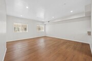 3BR, 3BA - 1421SF - Living Room - Sandra Manor Management Group