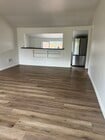 Kitchen peek through in apartment - 11305 Sheldon St