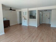 Dining area, kitchen, entry - 5600 Kensington Way Unit 102