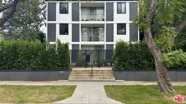 Building Photo - 414 N Palm Dr Unit 8