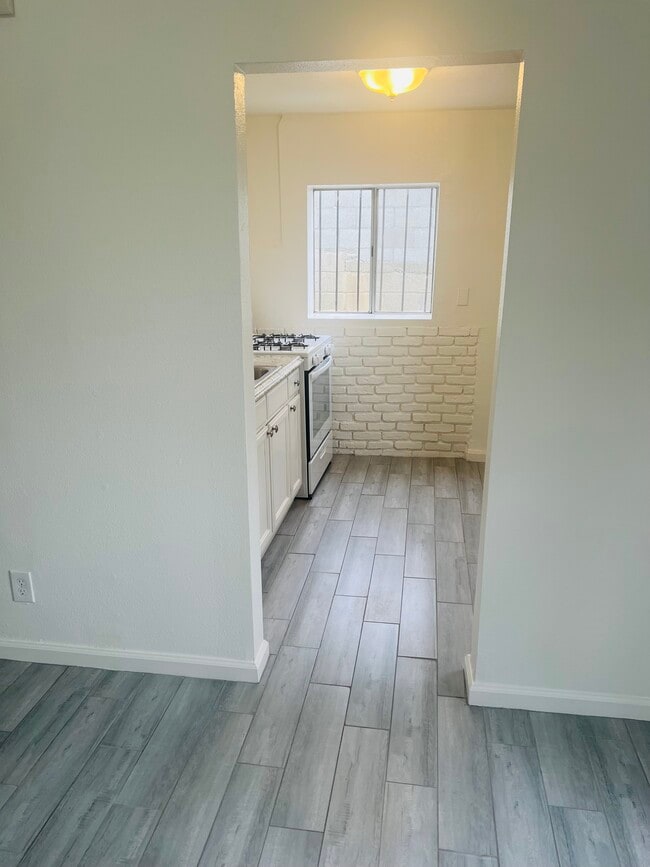 Building Photo - 1163 N Ditman Ave Unit A