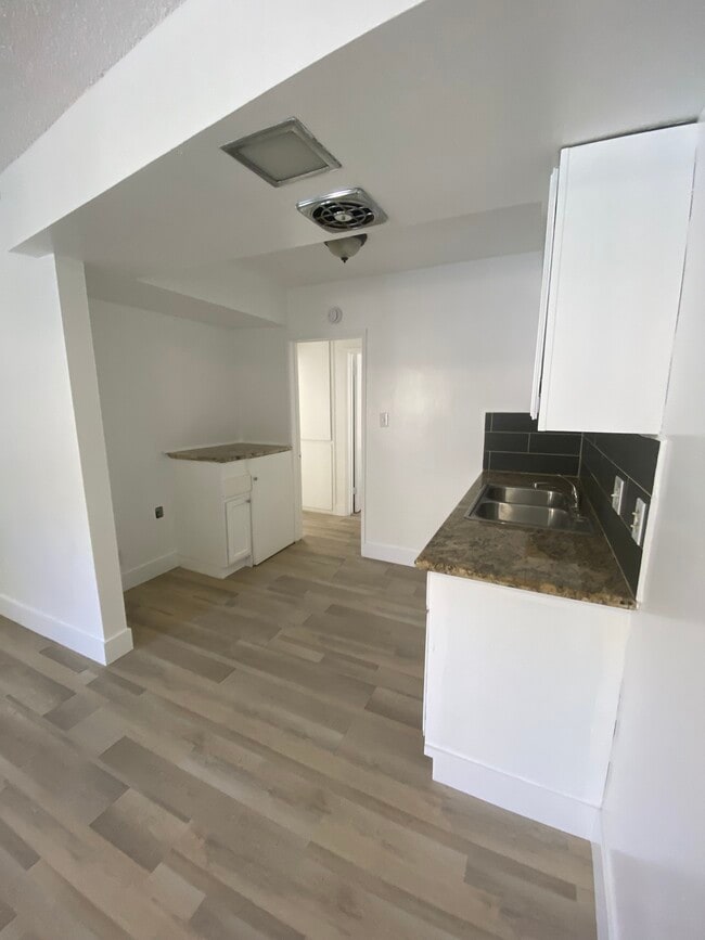 Kitchen. Space for fridge. - Sunshine Apartments