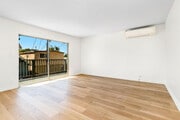 bright, large living room with A/C - 40 18th Ave Apartments Unit 3