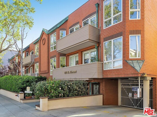 Building Photo - 121 N Almont Dr Unit 203 Rental