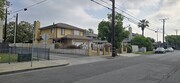 Outside of the house, next to children's playground - 151 E 6th St House
