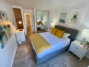 Bedroom with work desk and portable ac available - 3030 Suncrest Dr unit 402 Apartment Unit 3030 Suncrest Dr. 402
