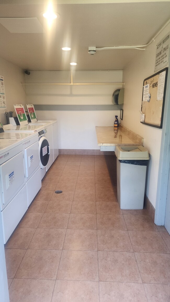 Laundry room - Stadium Arms Apartments
