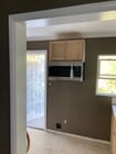 Brand new microwave, range is on order. - 1526 E Wilson Ave Unit Studio Apartment