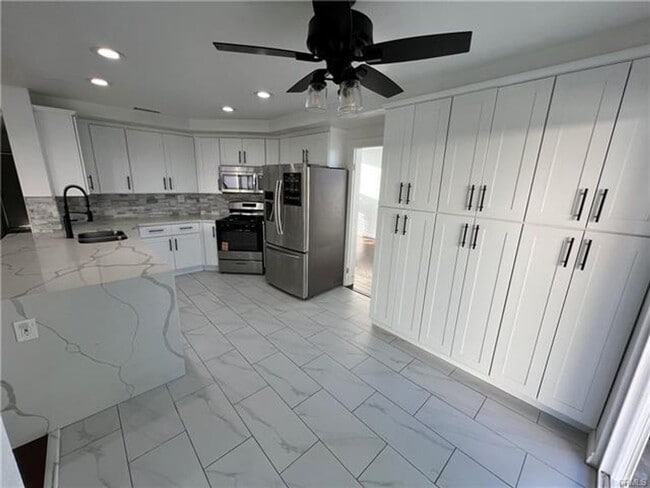 Photo - Beautifully Menifee Home with Three-Car Ga...