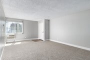 2BR, 2BA - 860SF - Living Room - Encasa Norwalk