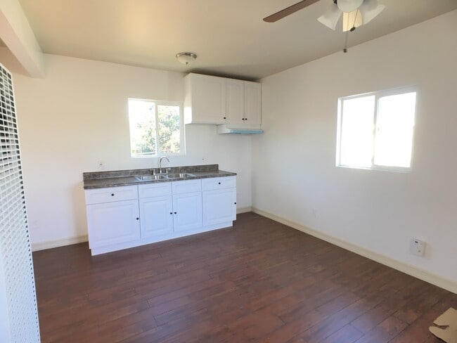 Full Kitchen, stove and fridge included - 1227 W 37th Dr House