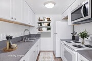 Kitchen with new granite counters - Vida Elegante Apartments