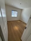 Remodeled bedroom - 1543 11th St Apartments Unit D