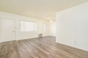 1BR, 1BA - 650SF - Living Room - 128 W Maple St Apartments