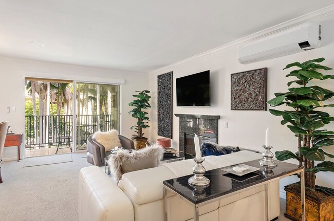 Photo - RARELY offered! Top floor three bedroom 2.5 bath El Escorial condo, fully furnished at East Beach.