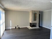 living room and fireplace - 1828 Camden Ave Condo Unit 108
