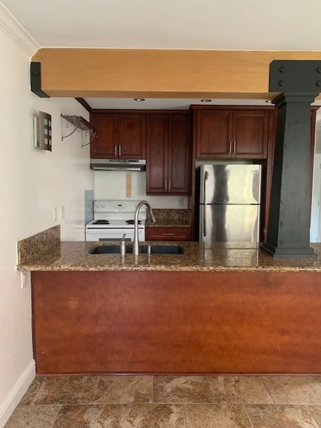 Photo - 1bd/1ba Lower, corner unit. Steps from BBQ area and laundry facilities.  Water/Sewer/Trash included! Unit 13