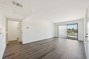1BR, 1BA - 700SF - Living Room - Campus Crossing Apartments - Northridge