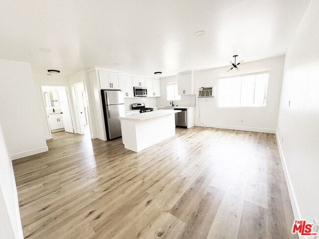 Building Photo - 5440 Carlton Way Unit 202 Rental