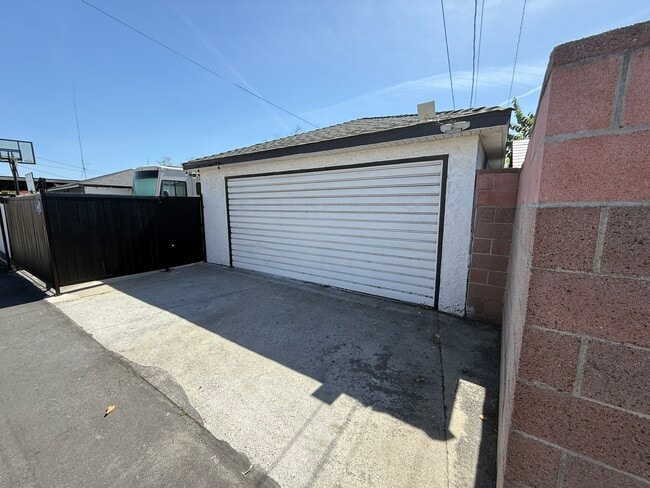 Private parking spot and entrance off alley - 9845 Rosecrans Ave Unit 1bdrm ADU