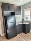 Plenty of storage around refrigerator - 579 W. 13th St Townhome