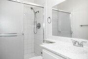 2BR, 2BA - 950SF - First Bathroom - Robin Meadows of Garden Grove Apartments