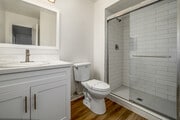 2BR, 2BA - 950SF - Primary Bathroom - Cape Cod Apartments