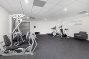 Fitness Center - Discover Modern Living in This Stylish 1-2... Apartments