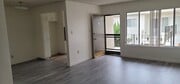 Apt 20 living room - Via Del Amo Apartments