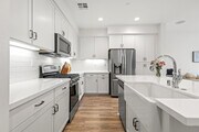 Sleek modern kitchen - 212 Red Brick Dr Townhome