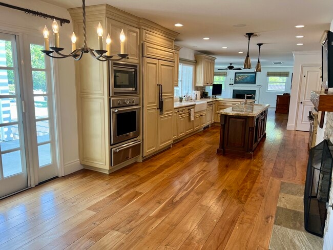 Open kitchen with Wolf and Thermador appliances - 4703 Ferncreek Dr