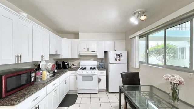 Building Photo - 4875 Cole St Unit 46