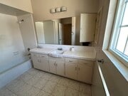 Sink/vanity - 147 Genoa St Apartments Unit D