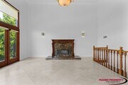 Photo - Spacious 5-Bedroom Home with Modern Amenit...
