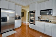 Kitchen with double oven and gas stove - 2212 Marshallfield Ln Townhome