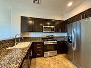 Photo - 3 Bed 2.5 Bath plus extra room Townhouse Style Condo / Attached 2 Car Garage