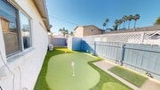 Photo - Charming 2-Bedroom Home with Mini Golf Course, Spacious Yard, and Ample Parking