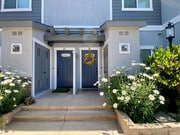 Front doors with beautiful planter gardens at The Nines Townhomes in Escondido, California. - The Nines Townhomes