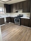 Photo - Spacious 4BR Cul-de-Sac Home with Large Backyard & Attached Garage