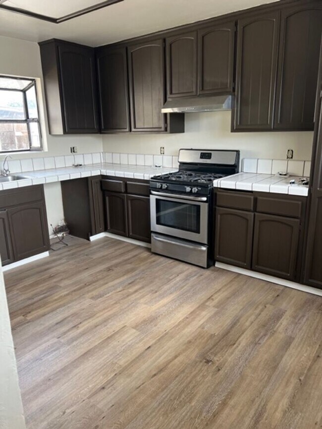 Photo - Spacious 4BR Cul-de-Sac Home with Large Backyard & Attached Garage