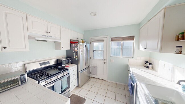 Photo - Charming 2-Bedroom Home with Mini Golf Course, Spacious Yard, and Ample Parking