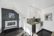 updated kitchen - 11 24th Ave Apartments Unit 2