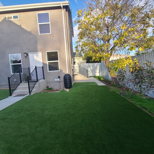 yard portion and back patio - 384 Hargrave St Townhome
