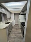 Kitchen with fridge, dishwasher, stove, mic.oven, washer-dryer - 424 Oak St Unit 227