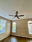 Living room with new ceiling fan/light - 285 Reef Point Way Unit 6  /Pelican Cove