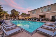 Spend the evening relaxing by our pool - Windsor Aviara Apartments