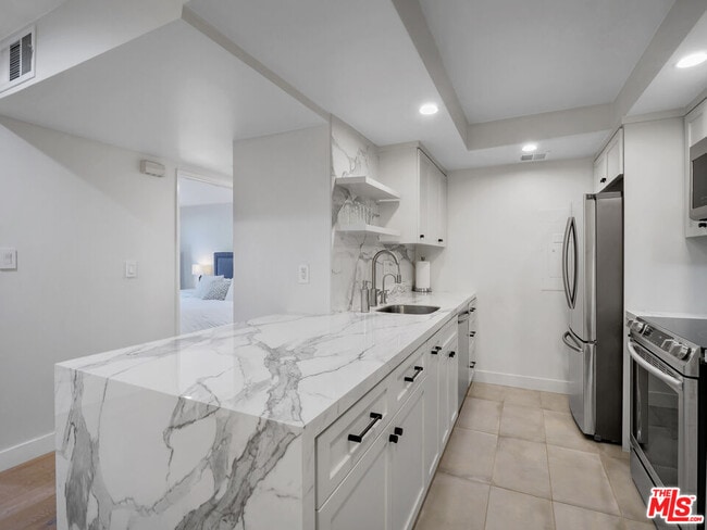 Photo - 1134 Alta Loma Rd Unit 203