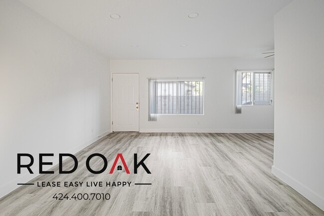 Building Photo - 1088 W 39th St Unit 4