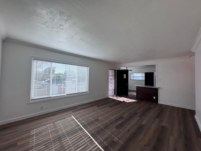 Photo - Charming 3-Bedroom Home with 2-Car Garage & Driveway Parking in North Long Beach